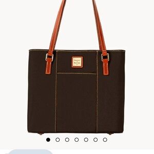 Dooney & Bourke Dark Brown Tote with Tan Straps
Comes with dust bag